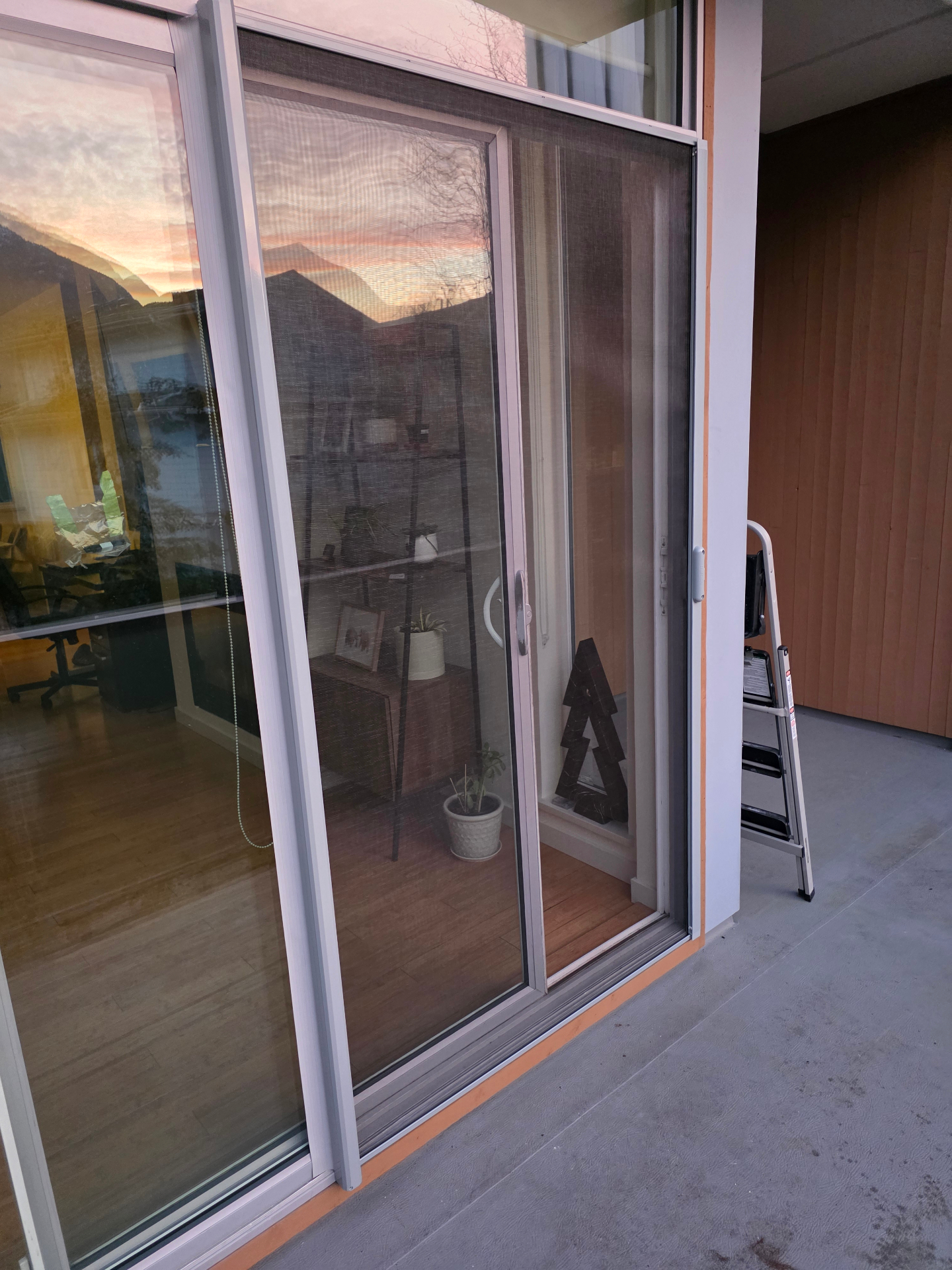 Complete retractable screen installation showing proper mounting